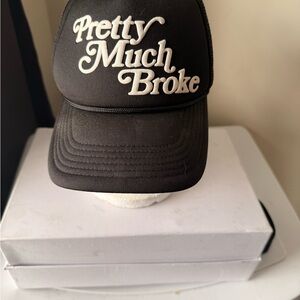 New Era Black Trucker Hat with White Embroidery